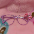 purple bow glasses